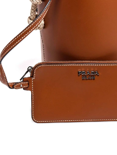 Shop Prada Logo Bucket Bag In Brown