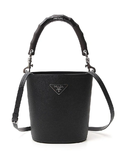 Shop Prada Logo Plaque Bucket Bag In Black