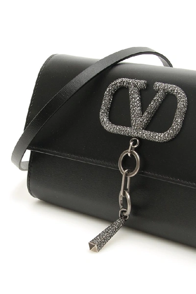 Shop Valentino Vcase Clutch Bag In Black