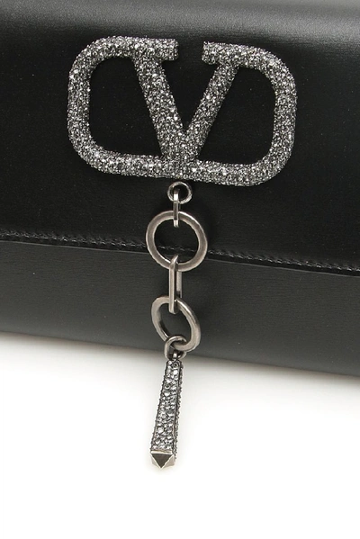 Shop Valentino Vcase Clutch Bag In Black