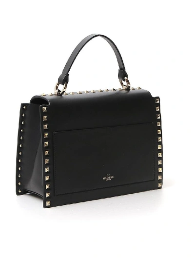 Shop Valentino Garavani Rockstud Top Handle Shoulder Bag In Black