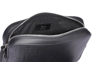 Shop Fendi Ff Embossed Messenger Bag In Black