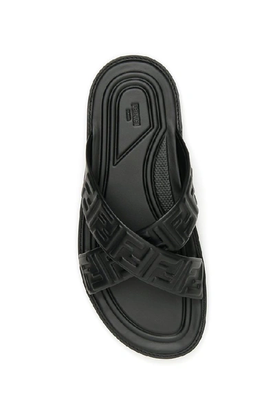 Shop Fendi Ff Logo Embossed Sandals In Black