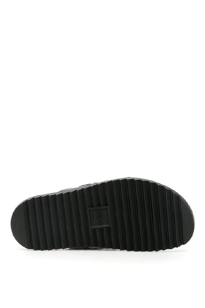 Shop Fendi Ff Logo Embossed Sandals In Black