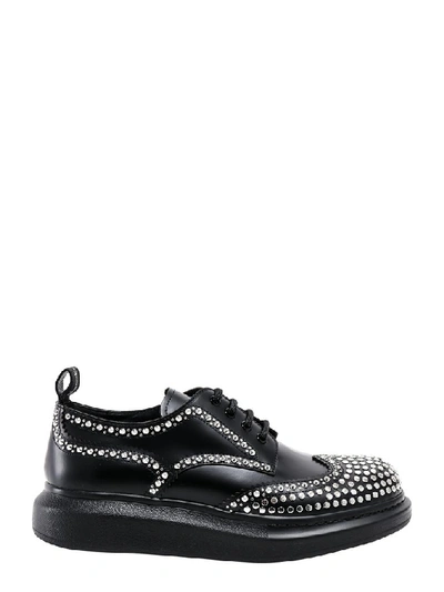 Shop Alexander Mcqueen Studded Lace Up Shoes In Black