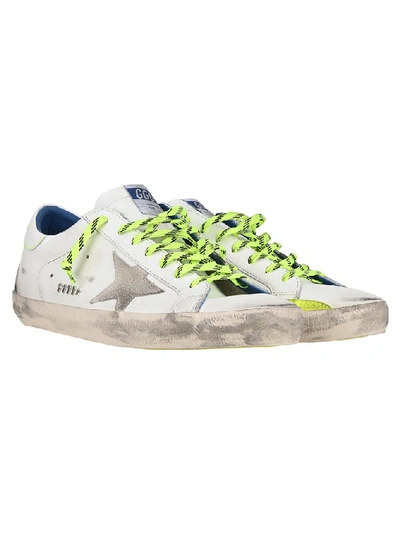 Shop Golden Goose Deluxe Brand Superstar Distressed Sneakers In White Fluo Giallo