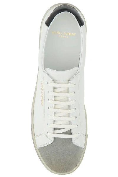 Shop Saint Laurent Distressed Low Top Sneakers In White