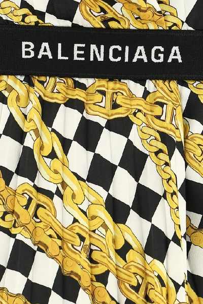 Shop Balenciaga Pleated Printed Skirt In Yellow