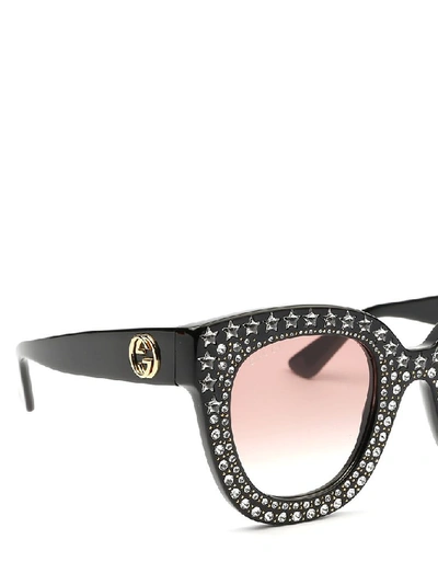 Shop Gucci Eyewear Studded Frame Sunglasses In Black