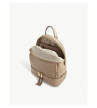 Shop Michael Michael Kors Rhea Medium Leather Backpack In Oyster