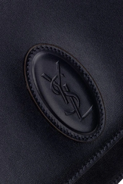 Shop Saint Laurent Logo Embossed Shoulder Bag In Black