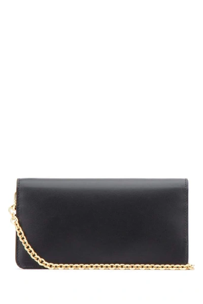 Shop Prada Logo Chain Clutch Bag In Black