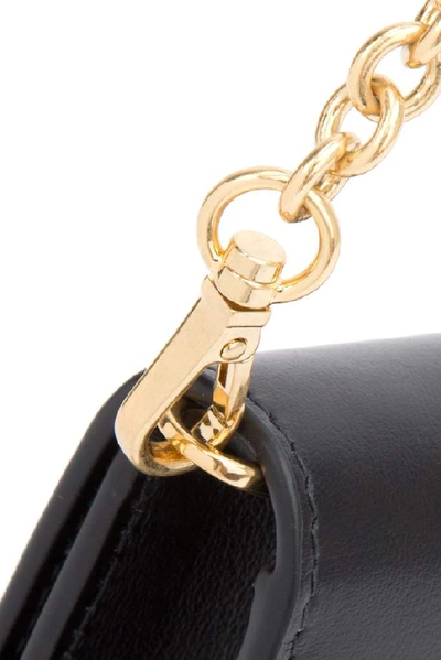Shop Prada Logo Chain Clutch Bag In Black