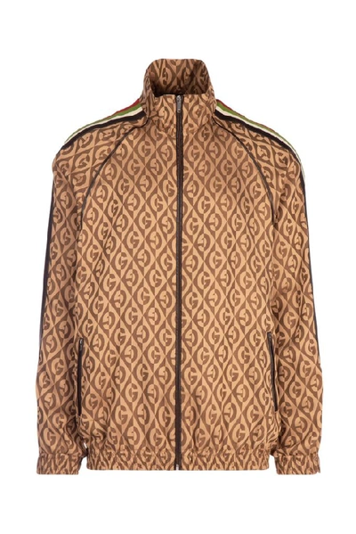 Shop Gucci G Rhombus Oversized Zip In Brown