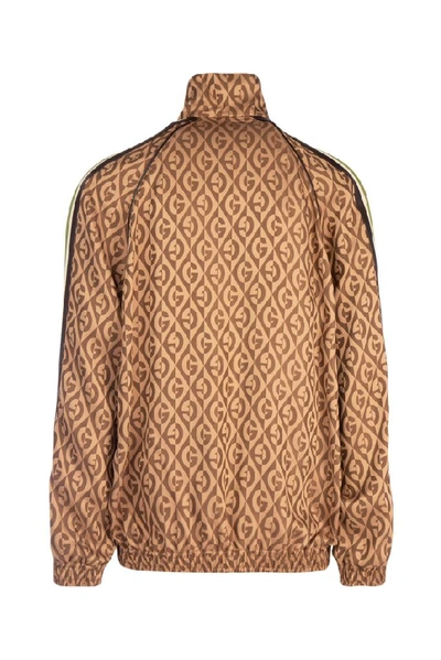 Shop Gucci G Rhombus Oversized Zip In Brown