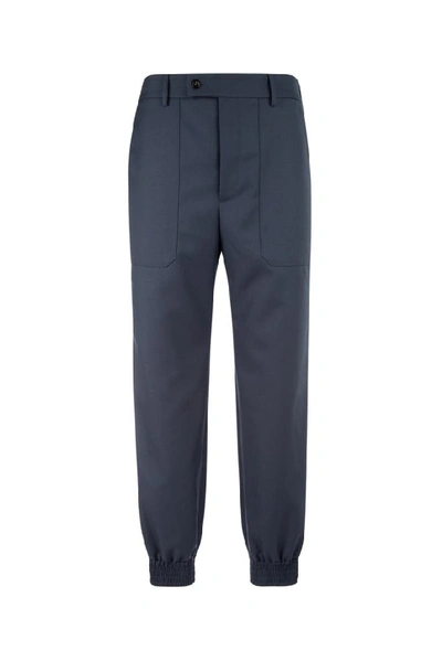Shop Gucci Pocketed Elastic Cuff Trousers In Blue