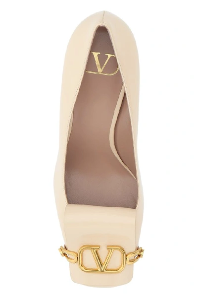 Shop Valentino Vlogo Buckle Pumps In Beige