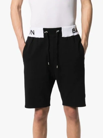 Shop Balmain Logo Waist Track Shorts In Black