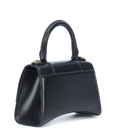 Shop Balenciaga Hourglass Xs Leather Crossbody Bag In Black