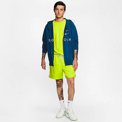 Shop Nike Men's Sportswear Flow Woven Shorts In Yellow