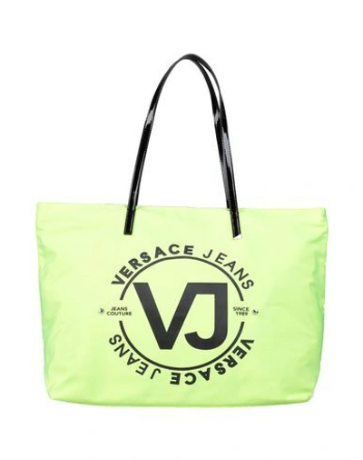 Shop Versace Jeans Handbags In Yellow
