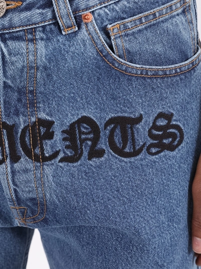 Shop Vetements Gothic Print Logo Jeans Blue