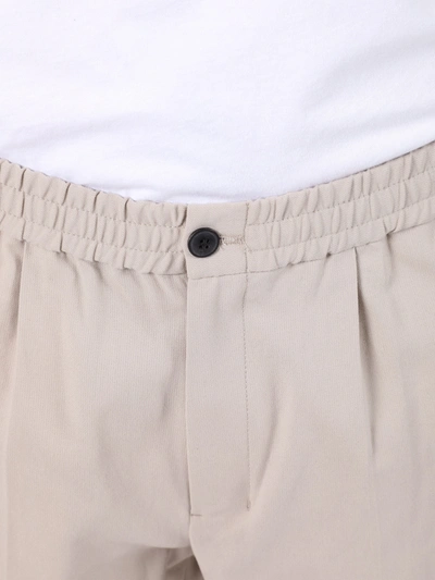 Shop Ami Alexandre Mattiussi Cropped Elasticized Pants In Neutral