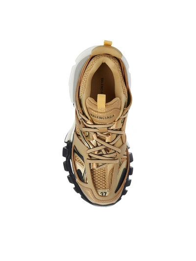 Shop Balenciaga Gold Track 2 Sneakers In Neutral