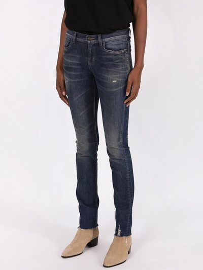 Shop Saint Laurent Blue Low-rise Jeans