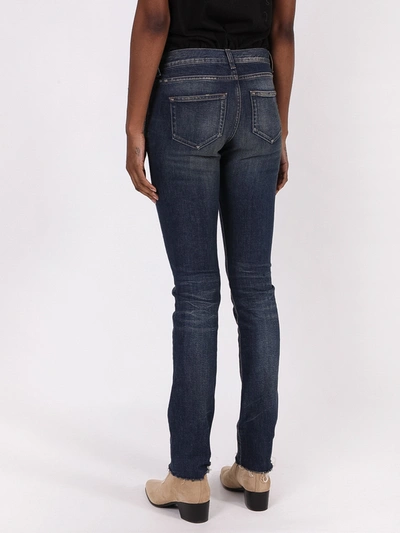 Shop Saint Laurent Blue Low-rise Jeans