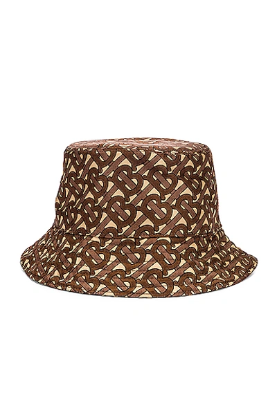 Shop Burberry Monogram Nylon Bucket Hat In Bridle Brown