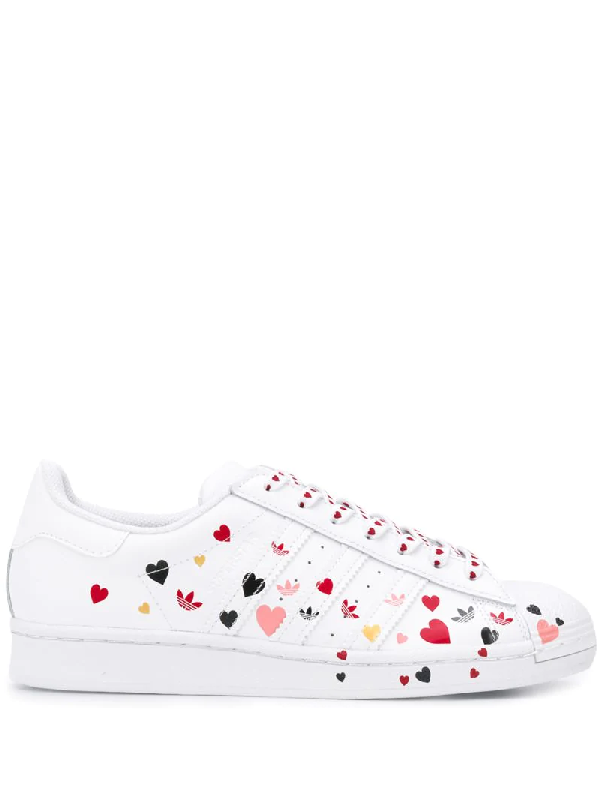 adidas originals heart print superstar sneaker in white