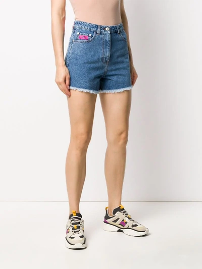 Shop Gcds Frayed Denim Shorts In Blue