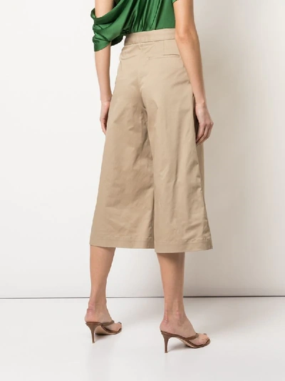 Shop Monse Cropped Pleated Wide-leg Trousers In Brown