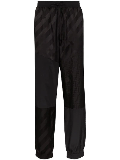 Shop Fendi Tonal Logo Track Pants In Black
