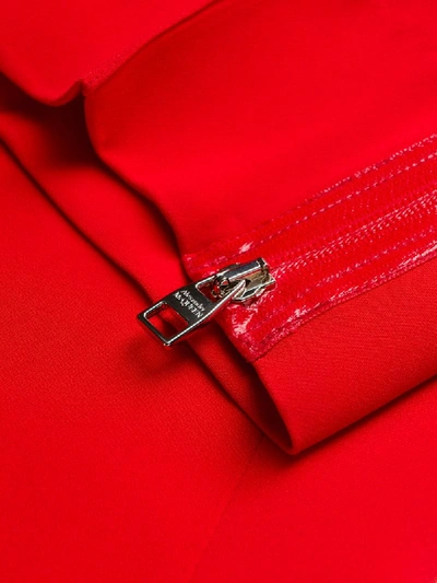 Shop Alexander Mcqueen Zip-cuff Trousers In Red