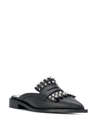 Shop Alexander Mcqueen Mules Mit Nieten In Black