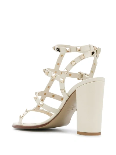 Shop Valentino Rockstud 100mm Sandals In Neutrals