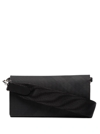 Shop Burberry Ollie Strap Shoulder Bag In Black
