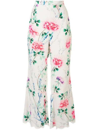 Shop Andrew Gn Floral-print Flared Trousers In White