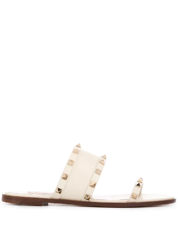 white slip on sandals