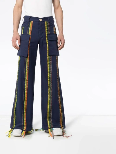 Shop Bethany Williams Striped Organic Cotton Trousers In Blue