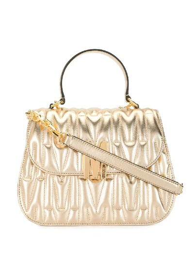 Shop Moschino Quilted M Top Handle Handbag In Gold