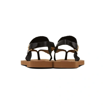 Shop Chloé Black Woody Flat Sandals