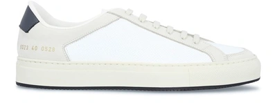 Shop Common Projects Baskets Retro Low 70s In White Navy