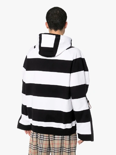 Shop Burberry Striped Logo Sleeve Cotton Hoodie In Black