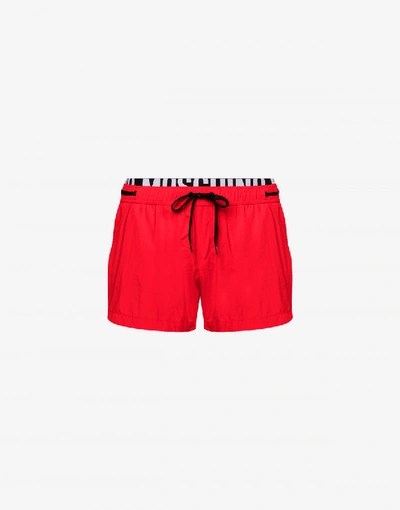 Shop Moschino Elastic Band Fluo Beach Boxer In Red