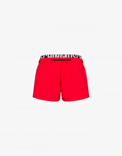 Shop Moschino Elastic Band Fluo Beach Boxer In Red