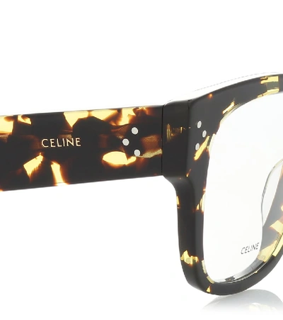 Shop Celine D-frame Glasses In Brown