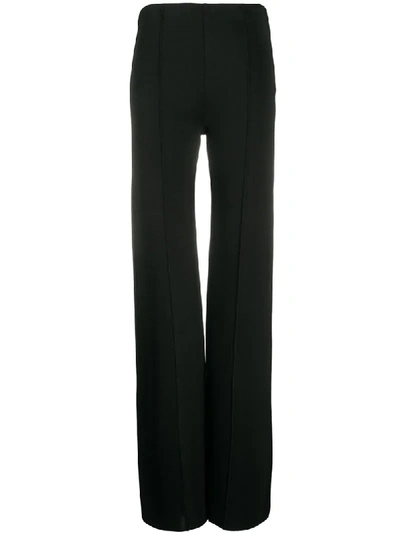 Shop Valentino Piped Seams Flared Trousers In Black